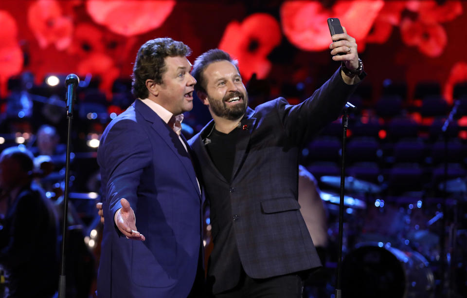 LONDON, ENGLAND - NOVEMBER 11:  Michael Ball and Alfie Boe take a selfie inbetween rehearsing for their performance at the Royal British Legion's Festival of Rememberance at Royal Albert Hall on November 11, 2016 in London, England.  The festival is being broadcast from 9.00pm on BBC 1 on Saturday.  (Photo by Tim P. Whitby/Getty Images for The Royal British Legion)