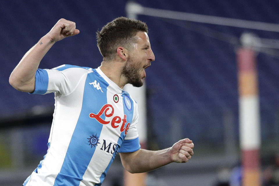 Napoli's Dries Mertens celebrates after scores against Roma during the Italian Serie A soccer match between Roma and Napoli at Rome's Olympic stadium, Sunday, March 21, 2021. (AP Photo/Gregorio Borgia)