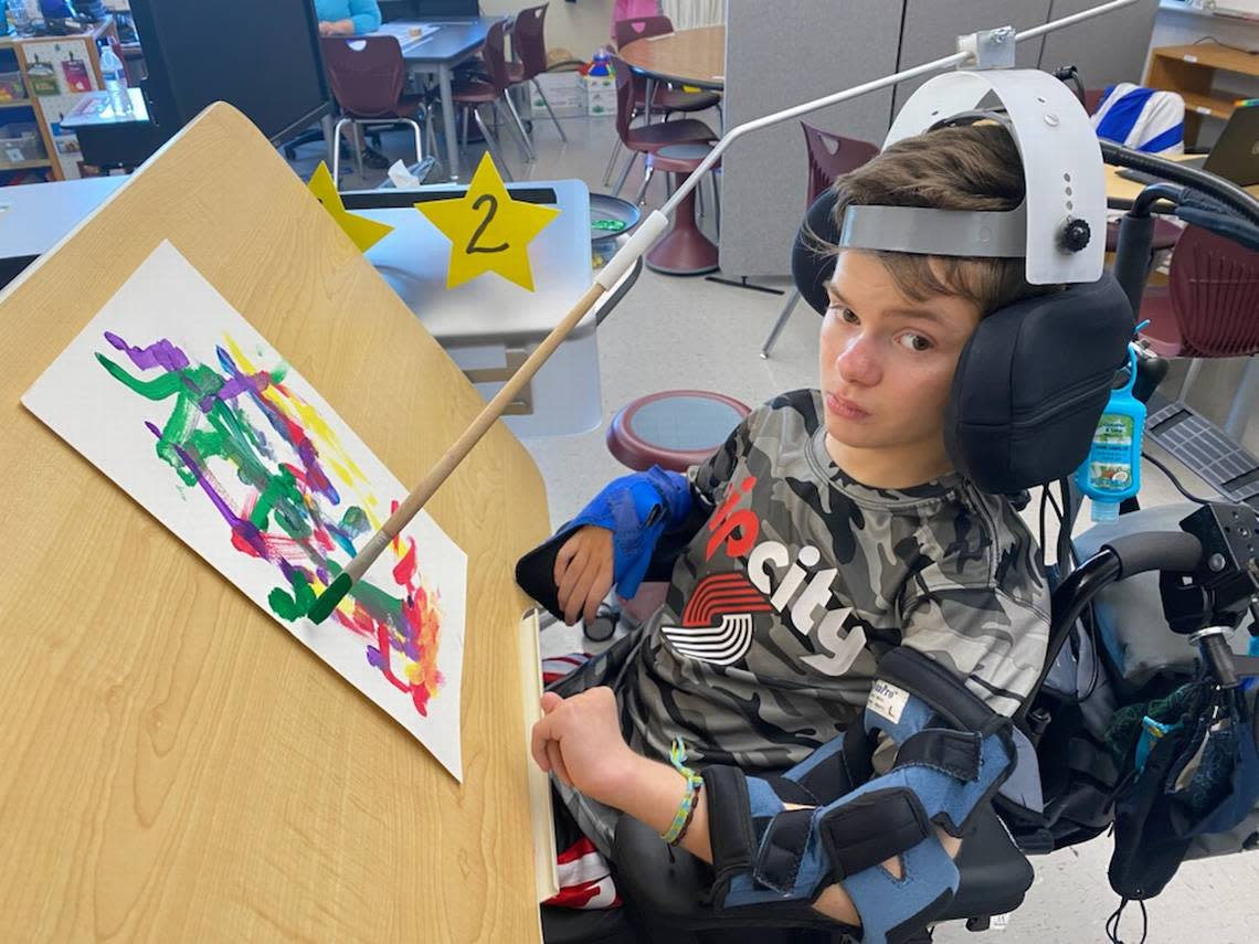 Gabe Scheel, 13, was recognized by the Pasco School District and Washington state for his dedication to learning and his painting he calls “Fun Joy.” He uses special eye-gaze technology for his schoolwork.