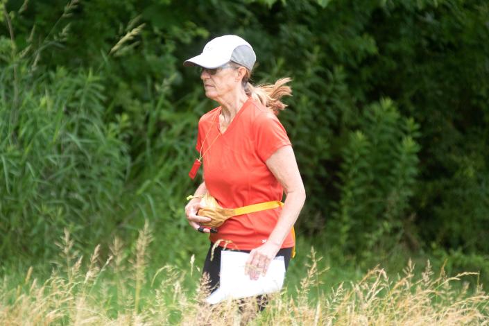 Karen Graffman of Allentown runs while orienteering as a part of Bucks County Senior Games at Tyler State Park in Newtown on Tuesday, June 14, 2022.