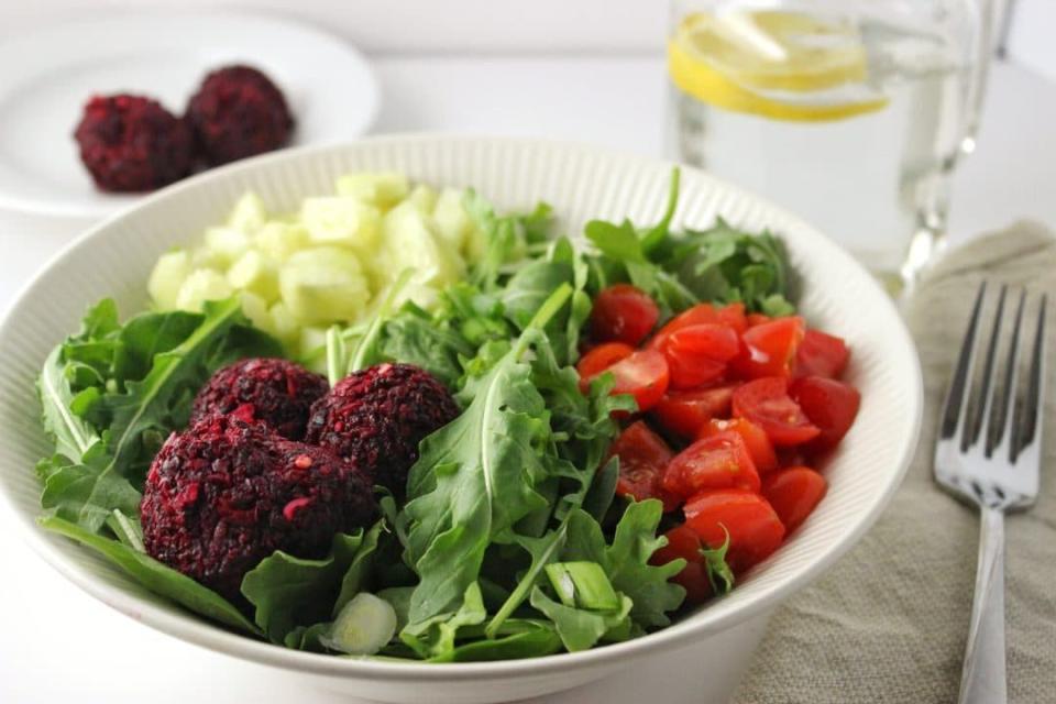 <p>These beet-flavored baked chickpea balls are perfect for whatever Mediterranean dish you want to make — from gyros to burger substitutes. But they're delicious in a fresh, simple lunch salad.</p><p><strong>Get the recipe at <a href="https://www.simplylakita.com/beetfalafelbowl/" rel="nofollow noopener" target="_blank" data-ylk="slk:Simply LaKita;elm:context_link;itc:0;sec:content-canvas" class="link ">Simply LaKita</a>.</strong></p><p><strong><a class="link " href="https://www.amazon.com/dp/B00282JL7G?tag=syn-yahoo-20&ascsubtag=%5Bartid%7C10050.g.34063059%5Bsrc%7Cyahoo-us" rel="nofollow noopener" target="_blank" data-ylk="slk:SHOP BAKING SHEETS;elm:context_link;itc:0;sec:content-canvas">SHOP BAKING SHEETS</a><br></strong></p>