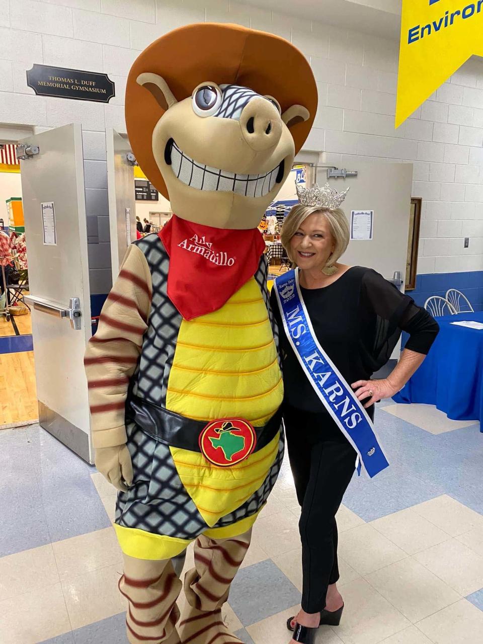 Ms. Karns, Cheri Doane, hangs out with Andy the Armadillo at the Karns Fall Festival at Karns Middle School Oct. 1, 2022.