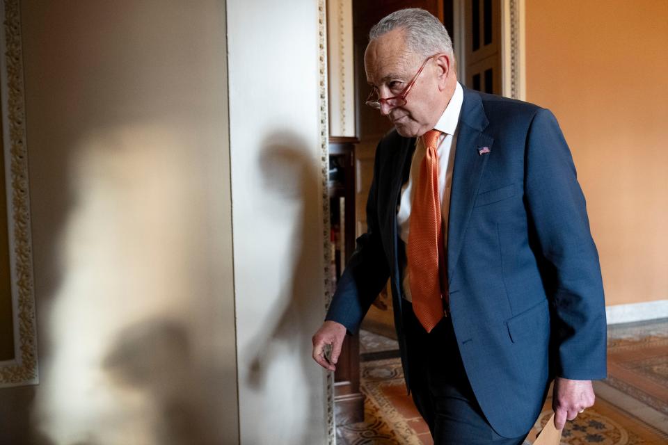 Senate Majority Leader Chuck Schumer of N.Y., walks out of a closed-door caucus meeting after the House approved a 45-day funding bill to keep federal agencies open, Sept. 30, 2023, in Washington. Schumer is headed to Israel to discuss what resources the United States can provide for its war against Hamas.