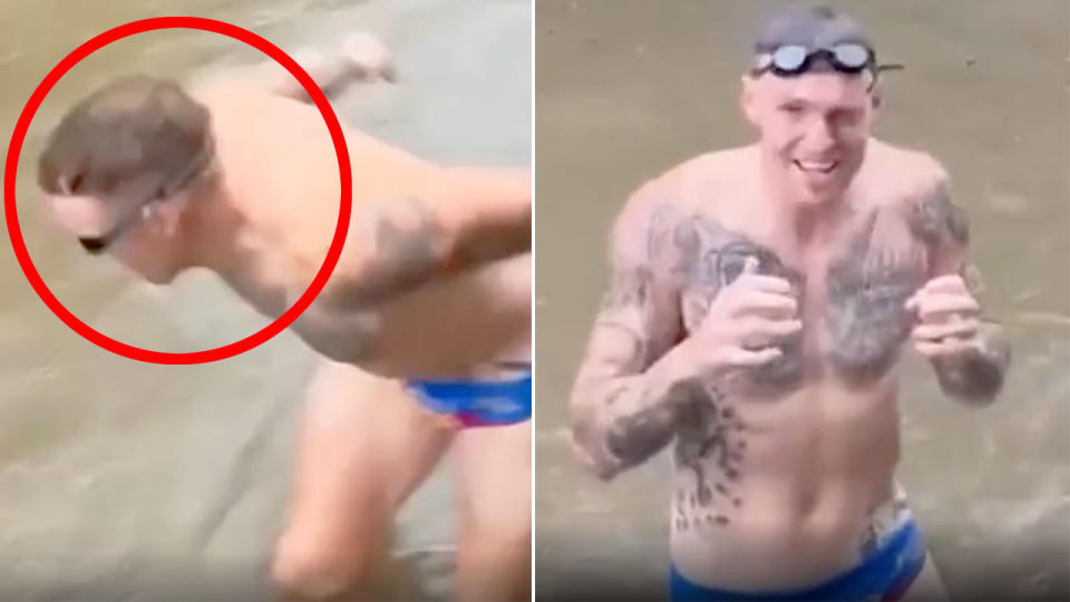 Seen here, Lions AFL star Mitch Robinson swims in Brisbane floodwaters. 