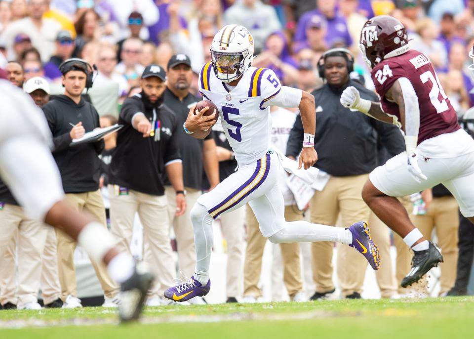 Quarterback Jayden Daniels 5 as the LSU Tigers take on Texas A&M in Tiger Stadium in Baton Rouge, Louisiana, November 25, 2023.