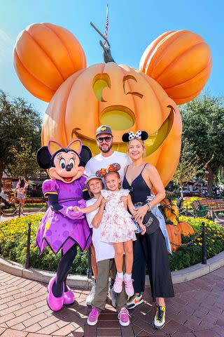 Sean Teegarden/Disneyland Resort via Getty Kate Hudson and fiancé Danny Fujikawa with kids Bingham and Rani Rose