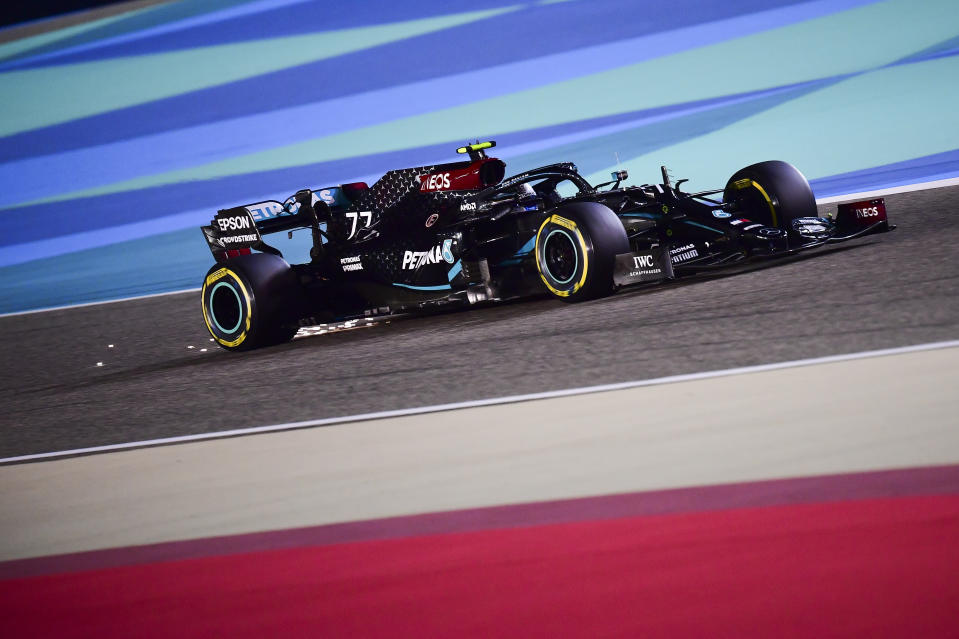 Mercedes driver Valtteri Bottas of Finland steers his car during the qualifying session at the Formula One Bahrain International Circuit in Sakhir, Bahrain, Saturday, Nov. 28, 2020. (Giuseppe Cacace, Pool via AP)