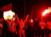 Protestors shout slogans against the change of the country's constitutional name in front of the Parliament building in Skopje, Macedonia June 23, 2018. REUTERS/Ognen Teofilovski