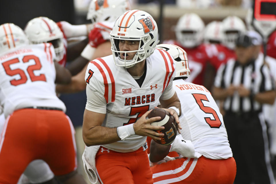 FILE - Mercer quarterback Carter Peevy (7) looks to pass during the first half of the team's NCAA college football game against Mississippi in Oxford, Miss., Sept. 2, 2023. Mercer, making its first appearance in the Football Championship Subdivision playoffs, faces Gardner-Webb in the first round. (AP Photo/Thomas Graning, File)