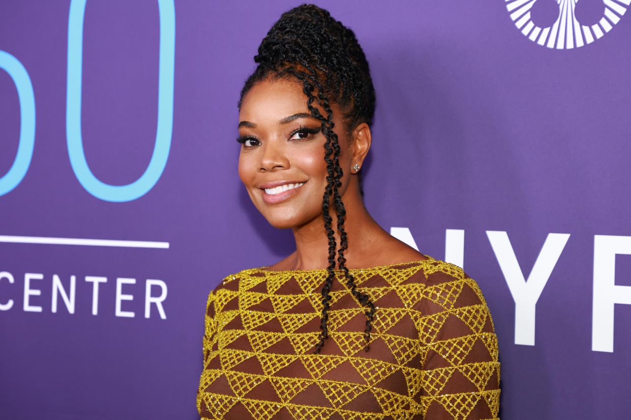 Gabrielle Union is sharing the red carpet spotlight with her loved ones. (Photo by Arturo Holmes/Getty Images for FLC)