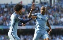 Britain Football Soccer - Manchester City v Hull City - Premier League - Etihad Stadium - 8/4/17 Manchester City's Fabian Delph celebrates scoring their third goal with Leroy Sane Action Images via Reuters / Ed Sykes Livepic