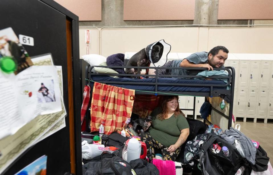 Genie Garcia and her son Juan are currently staying at the Stanislaus County’s 182-bed low-barrier shelter, with their dogs, having been homeless since 2016. Photographed at the Salvation Army Berberian Center in Modesto, Calif., Wednesday, Nov. 22, 2023.