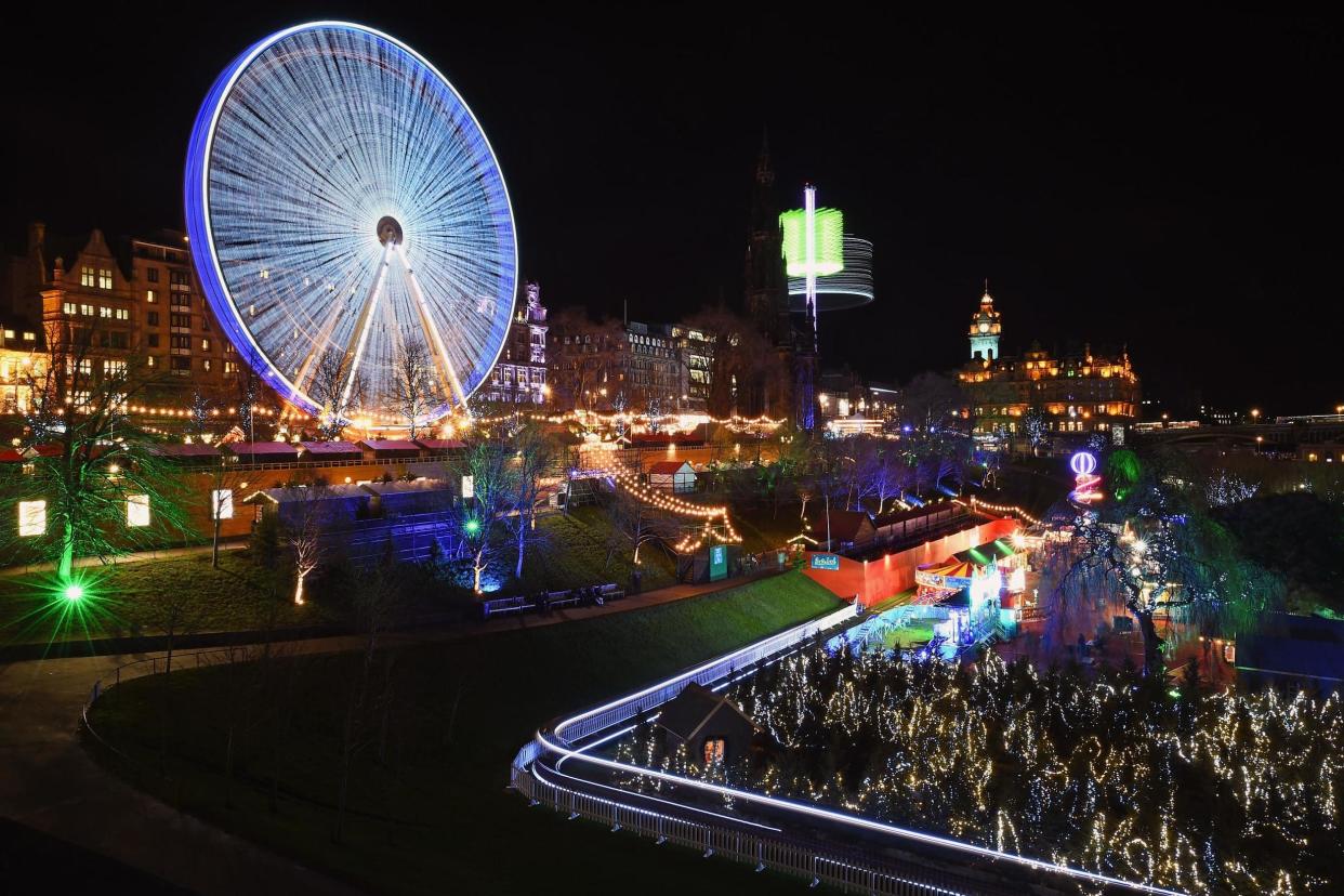 A file picture of members of the public enjoying the Christmas Market in Princes Street Gardens, Edinburgh: Getty Images