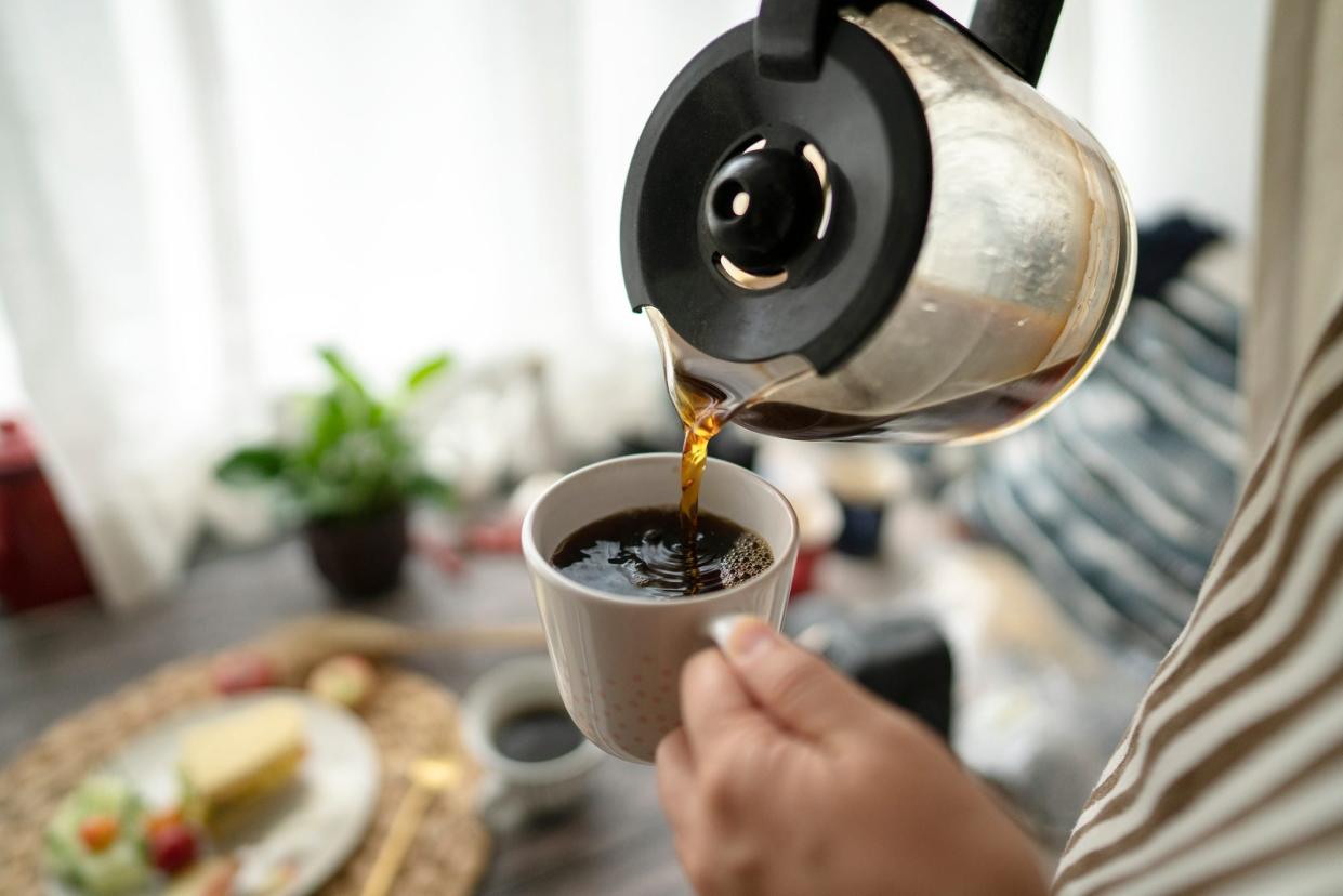 pouring coffee at breakfast