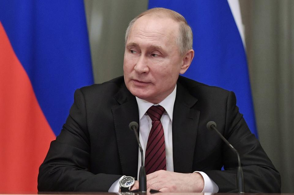 Russian President Vladimir Putin attends a new cabinet meeting in Moscow, Russia, Tuesday, Jan. 21, 2020. Putin formed his new Cabinet Tuesday, replacing many of its members but keeping his foreign, defense and finance ministers in place. (Alexei Nikolsky, Sputnik, Kremlin Pool Photo via AP)