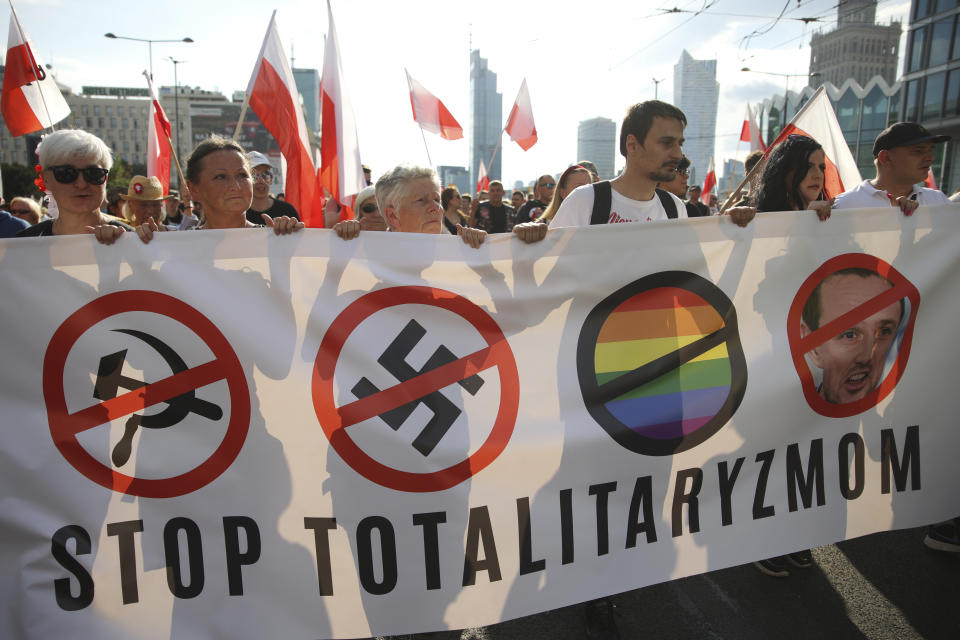 Supporters of the far-right organization National-Radical Camp, ONR, take part in the commemoration of the 1944 Warsaw Uprising, in Warsaw, Poland, Monday Aug. 1, 2022. Poles are marking the 78th anniversary of the Warsaw Uprising, a doomed revolt against Nazi German forces during World War II. (AP Photo/Michal Dyjuk)