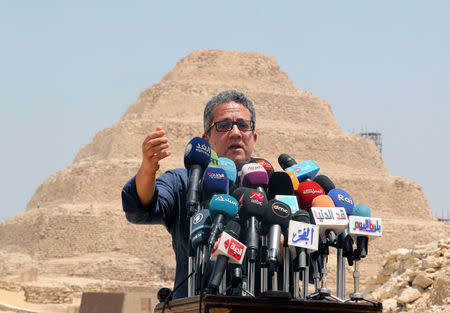 Egyptian minister of antiquities Khaled al-Anany speaks during the unveiling of a recently discovered burial site near Egypt's Saqqara necropolis,in Giza Egypt July 14, 2018. REUTERS/Mohamed Abd El Ghany