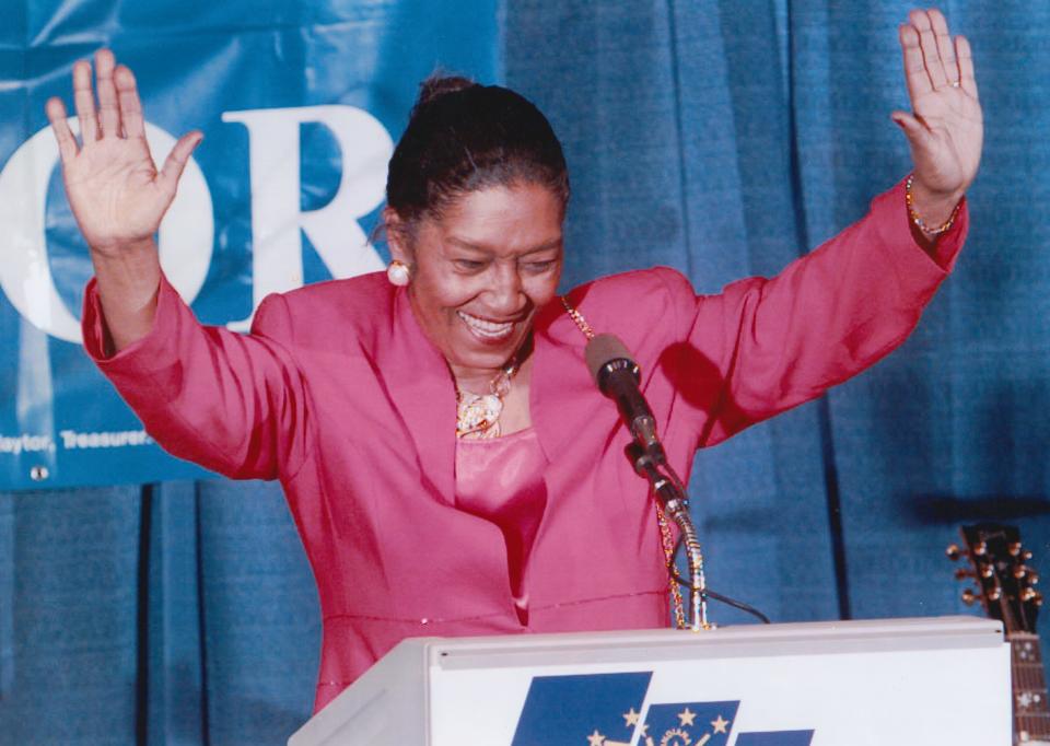 Julia Carson celebrates on stage at the convention center after her 10th Congressional District race victory Nov. 5, 1996