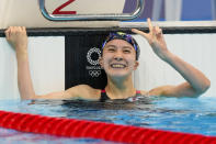 Yui Ohashi, of Japan, reacts after winning the women's 200-meter individual medley final at the 2020 Summer Olympics, Wednesday, July 28, 2021, in Tokyo, Japan. (AP Photo/Martin Meissner)