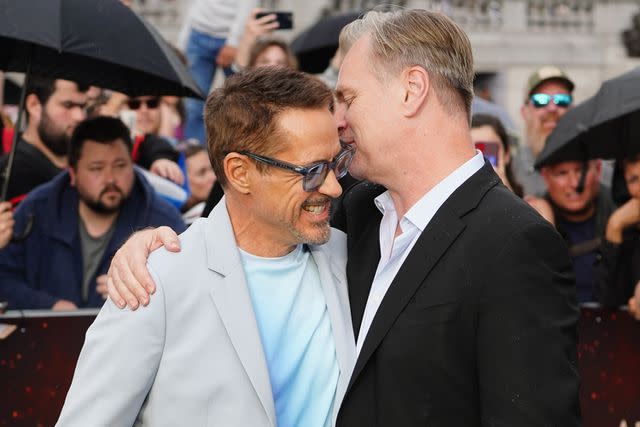 <p>Ian West/PA Images via Getty</p> Robert Downey Jr. and Christopher Nolan on July 12, 2023