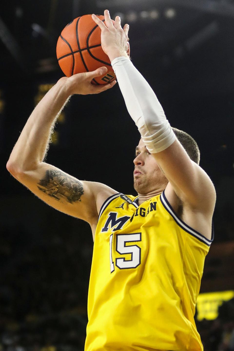 Michigan guard Joey Baker shoots a 3-point basket against Wisconsin during overtime of U-M's 87-79 win on Sunday, Feb. 26, 2023, at Crisler Center.