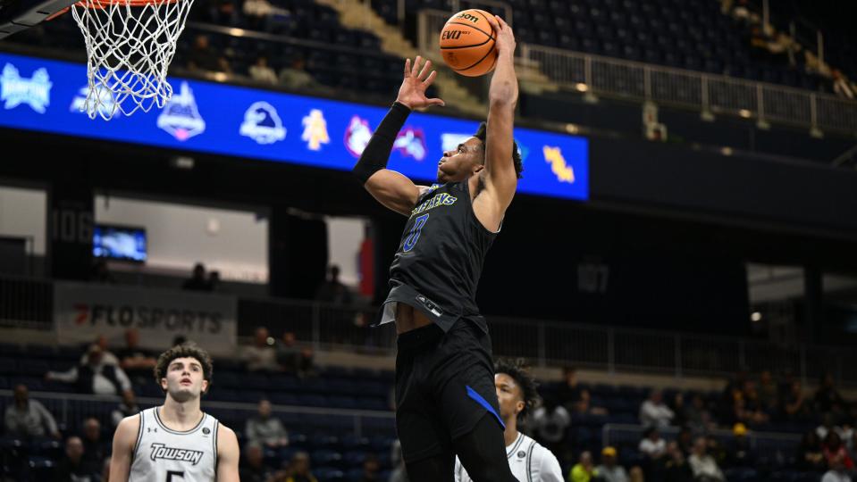 Jameer Nelson Jr. drives to the basket in Delaware's CAA Tournament loss to Towson Sunday night.