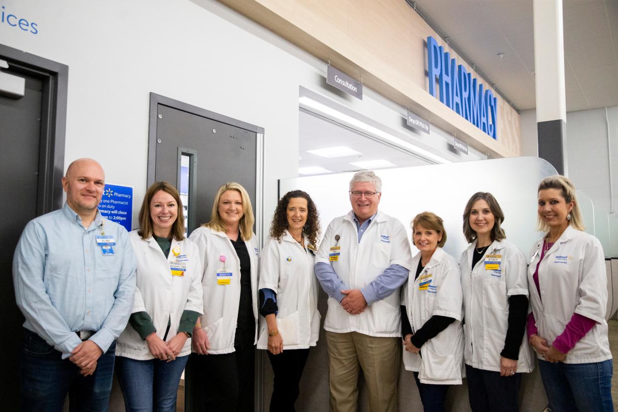 The pharmacy team at the Walmart Pharmacy in Collierville poses for a portrait in front of the pharmacy in Collierville, Tenn., on Wednesday, Jan. 24, 2024. This group of pharmacists is the longest-tenured pharmacist group across the entire Walmart company.