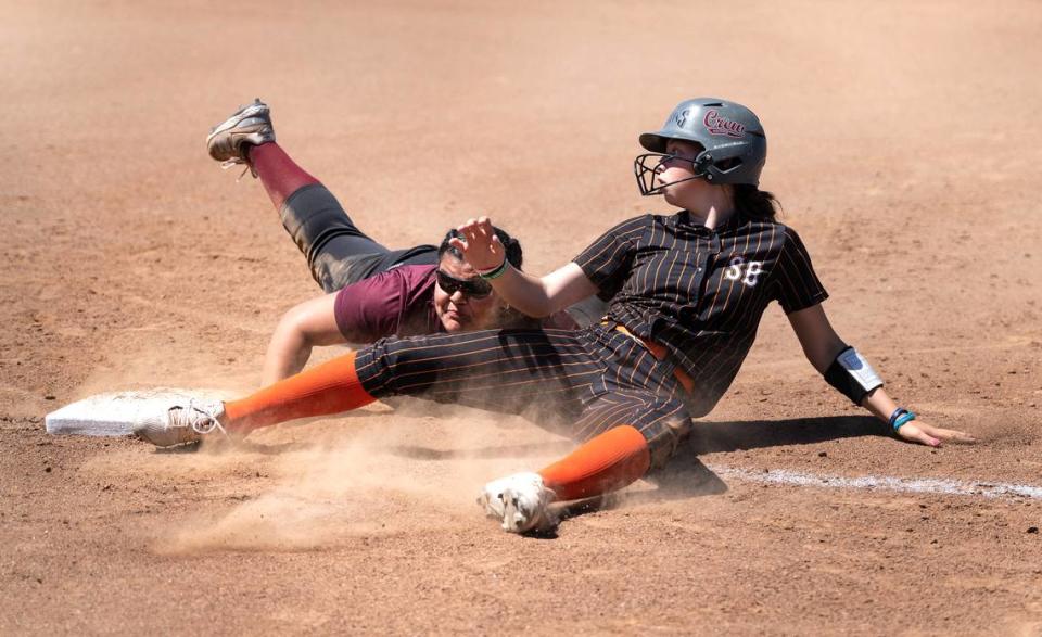 Riverbank’s Aliyah Felix tags out Summerville’s Kylie Graham during the Sac-Joaquin Section Division VI championship game at Cosumnes River College in Sacramento, Calif., Saturday, May 20, 2023.