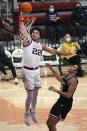 Gonzaga forward Anton Watson (22) dunks against Santa Clara forward Camaron Tongue (21) during the second half of an NCAA college basketball game Saturday, Jan. 15, 2022, in Santa Clara, Calif. (AP Photo/Tony Avelar)