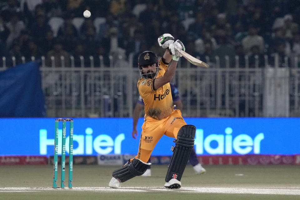 Peshawar Zalmi' Babar Azam plays a shot during the Pakistan Super League T20 cricket match between Peshawar Zalmi and Quetta Gladiators, in Rawalpindi, Pakistan, Friday, March 8, 2024. (AP Photo/Anjum Naveed)