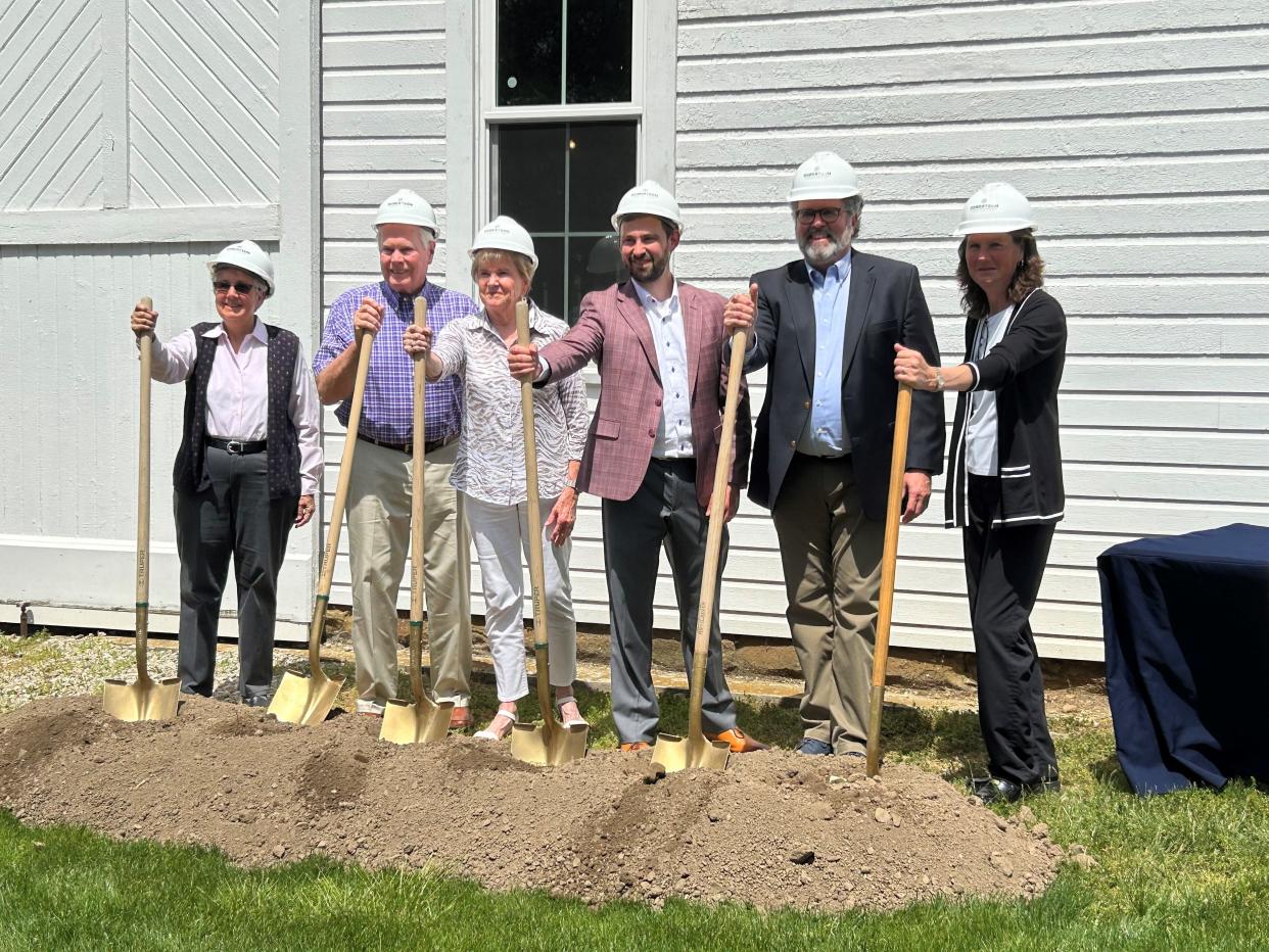 From left, Bryn Du Commission President Candi Moore, donors Larry and Penny Sargent, Licking County Community Center for 60+ Adults Board President Zach Reuscher, Granville Community Foundation President David Ball and Granville Mayor Melissa Hartfield pose for a photo May 1 during a groundbreaking ceremony for a $1.5 million renovation of the historic barn at the Bryn Du Mansion. The renovation will transform the barn's first floor into a home for the Community Center.