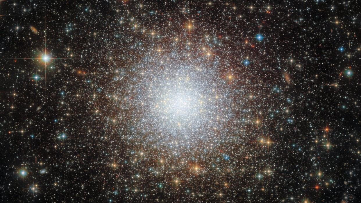  An extremely starry scene in space. The center looks like a white haze, and it's where lots of the stars are congregated. 