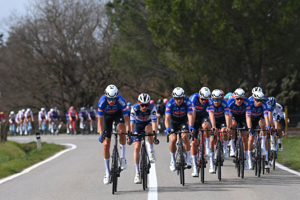 FOLIGNO ITALY  MARCH 08 LR Dries Devenyns of Belgium and Team Soudal QuickStep Robert Stannard of Australia and Mathieu van der Poel of The Netherlands and Team AlpecinDeceuninck lead the peloton during the 58th TirrenoAdriatico 2023 Stage 3 a 216km stage from Follonica to Foligno 231m  UCIWT  TirrenoAdriatico  on March 08 2023 in Foligno Italy Photo by Tim de WaeleGetty Images