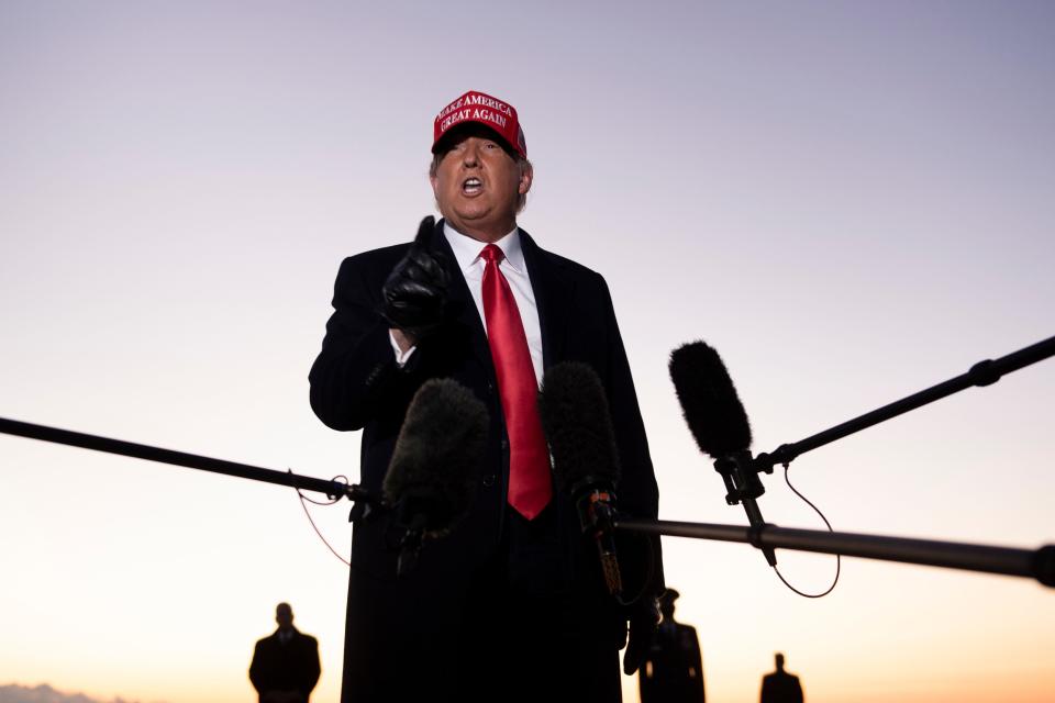 President Donald Trump speaks to the press at Charlotte Douglas International Airport on Nov. 1. Trump vowed to again defy the polls as he sprinted through five swing states in a blitz of campaigning against Joe Biden with just two days left before the US presidential election.