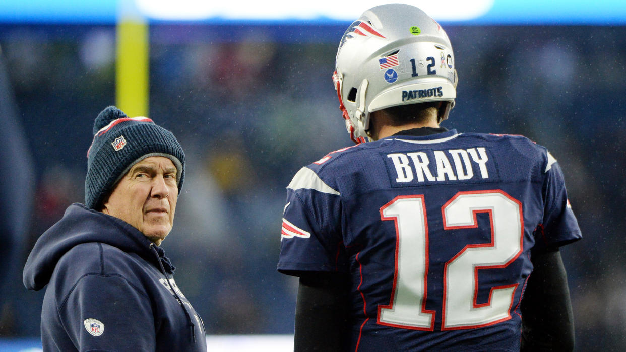 FOXBOROUGH, MASSACHUSETTS - NOVEMBER 24: Head coach Bill Belichick of the New England Patriots talks with Tom Brady #12 before the game against the Dallas Cowboys at Gillette Stadium on November 24, 2019 in Foxborough, Massachusetts. (Photo by Kathryn Riley/Getty Images)