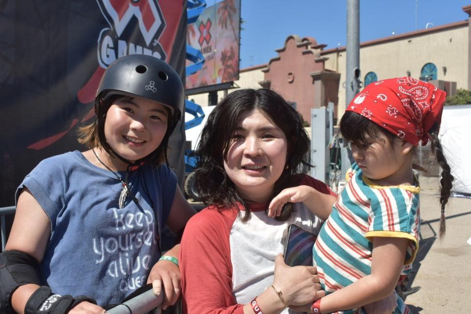 X Games skateboarder Juno, her mother Maki and Juno’s 4-year-old sister, Kiko Matsuok pose for a photo at a practice Thursday, July 20, 2023.