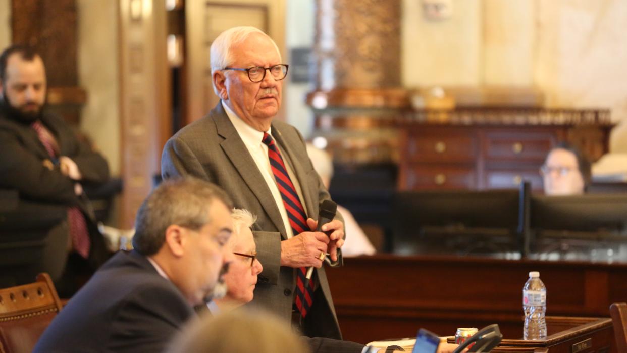 Sen. Rick Wilborn, R-McPherson, listens to floor speeches on a proposed set of congressional maps approved Friday in the Kansas Senate.