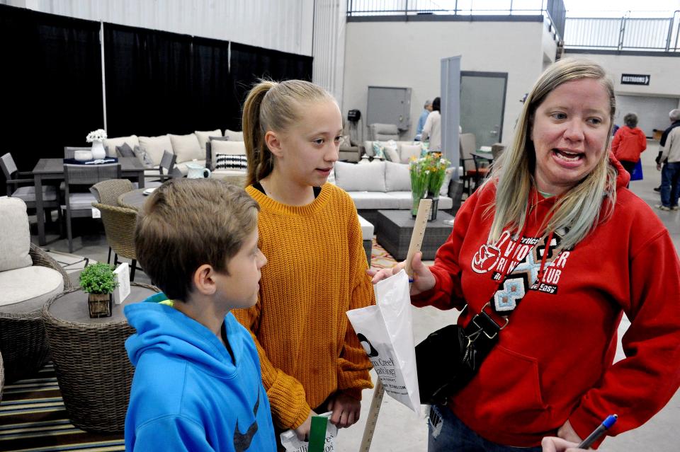 Robbie, 11, and Sarabeth, 13, spent Saturday with their mom, Beth Babulski, checking out the 32nd annual Home and Garden Show at the Wayne County Fair Event Center in Wooster.