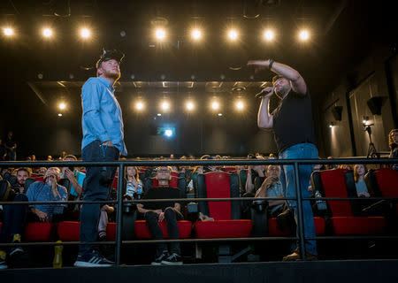 Founders of the New Cave Media Sergiy Polezhaka (R) and Alexey Furman attend a presentation of a simulator of virtual reality showing the 2013/2014 demonstration in Ukraine, when dozens of protesters were killed in the final moments of Viktor Yanukovich's rule, in Kiev, Ukraine September 12, 2018. Picture taken September 11, 2018. REUTERS/Gleb Garanich