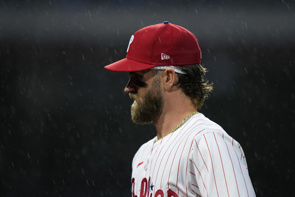 Philadelphia Phillies' Bryce Harper walks to the dugout after the first inning of a baseball game against the San Francisco Giants, Saturday, May 4, 2024, in Philadelphia. (AP Photo/Matt Slocum)