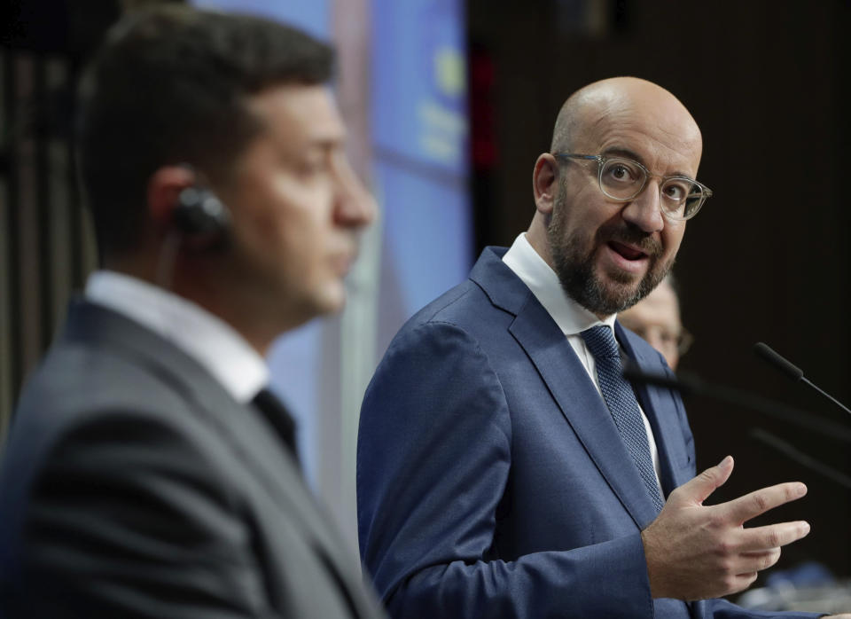 European Council President Charles Michel, right, speaks next to Ukrainian President Volodymyr Zelenskiy during an online news conference at the end of the EU-Ukraine summit at the European Council in Brussels, Tuesday, Oct. 6, 2020. The leaders discussed ways to strengthen EU-Ukraine relations, the long-running conflict in eastern Ukraine and ways to help the country weather the impact of the coronavirus. (Stephanie Lecocq/Pool Photo via AP)