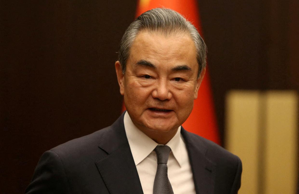 Chinese Foreign Minister Wang Yi poses as he meets Turkish Foreign Minister Hakan Fidan, 26 July 2023 (via REUTERS)