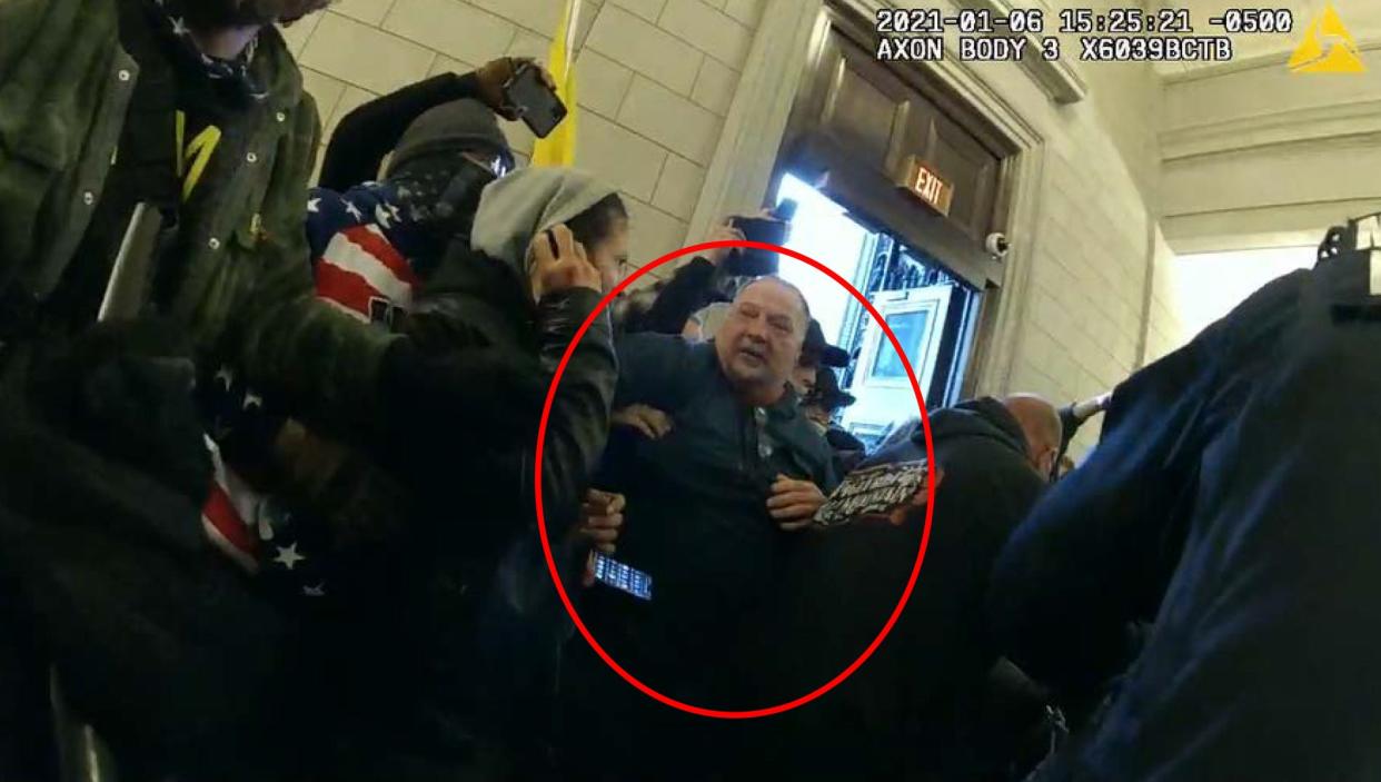 Joseph Fischer, circled, is seen in photos that were part of an FBI arrest warrant. Joseph Fischer, a former police officer in central Pennsylvania, faces seven charges including disorderly conduct and impeding police officers in the Capitol riot on Jan. 6, 2021. Fischer made it inside the Rotunda before police pepper-sprayed him and he left after about 4 minutes, according to court records. “Take democratic congress to the gallows,” Fischer wrote during the riot, according to court records. “Can’t vote if they can’t breathe..lol.”