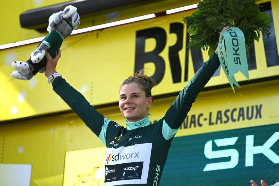 MONTIGNACLASCAUX FRANCE  JULY 25 Lotte Kopecky of Belgium and Team SD Worx  Protime celebrates at podium asGreen Points Jersey winner during the 2nd Tour de France Femmes 2023 Stage 3 a 1472km stage from CollongeslaRouge to MontignacLascaux  UCIWWT  on July 25 2023 in MontignacLascaux France Photo by Alex BroadwayGetty Images