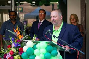 At the Podium: Todd Wainwright, SVP Head of Commerce & Strategic Partnerships; In the Background:  Mayor Roger Steele of Grand Island, Cindy Johnson, President of the Grand Island Chamber of Commerce