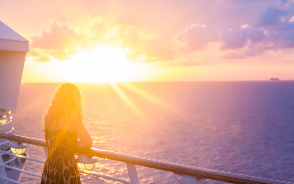 Sunset from a cruise ship - istock