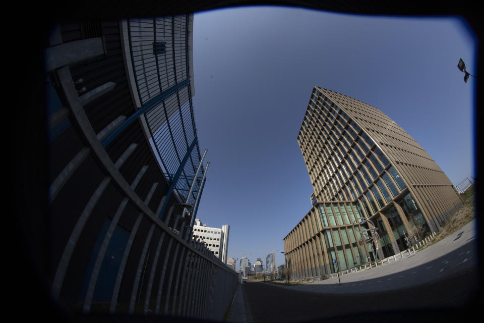 Exterior view of the European Medicines Agency, EMA, in Amsterdam's business district, Netherlands, Tuesday, April 20, 2021. Experts at the European Medicines Agency are preparing to present the conclusions of their investigation later on Tuesday into possible links between the Johnson & Johnson coronavirus vaccine and very rare cases of unusual clotting disorders detected in the U.S. (AP Photo/Peter Dejong)