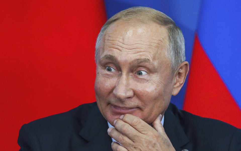 Russian President Vladimir Putin smiles, during his joint news conference with Chinese President Xi Jinping, at the Eastern Economic Forum in Vladivostok, Russia, Tuesday, Sept. 11, 2018. (Alexander Ryumin/TASS News Agency Pool Photo via AP)