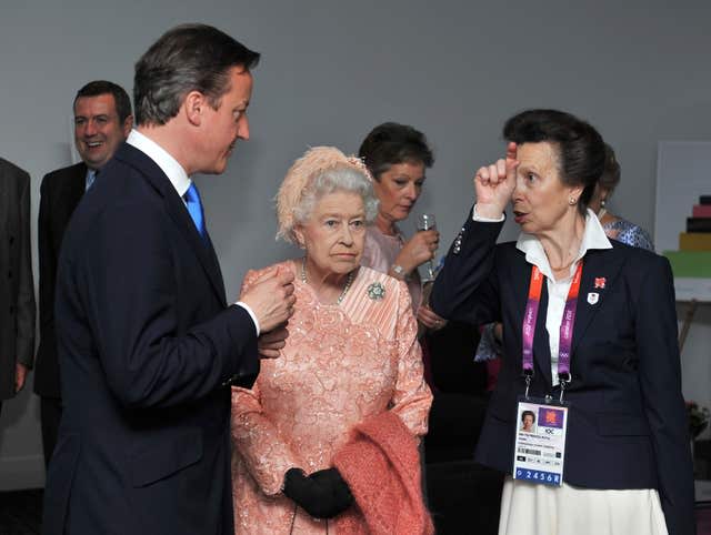 Queen Elizabeth II with the Princess Royal and Prime Minister David Cameron at the London 2012 Olympic opening ceremony 