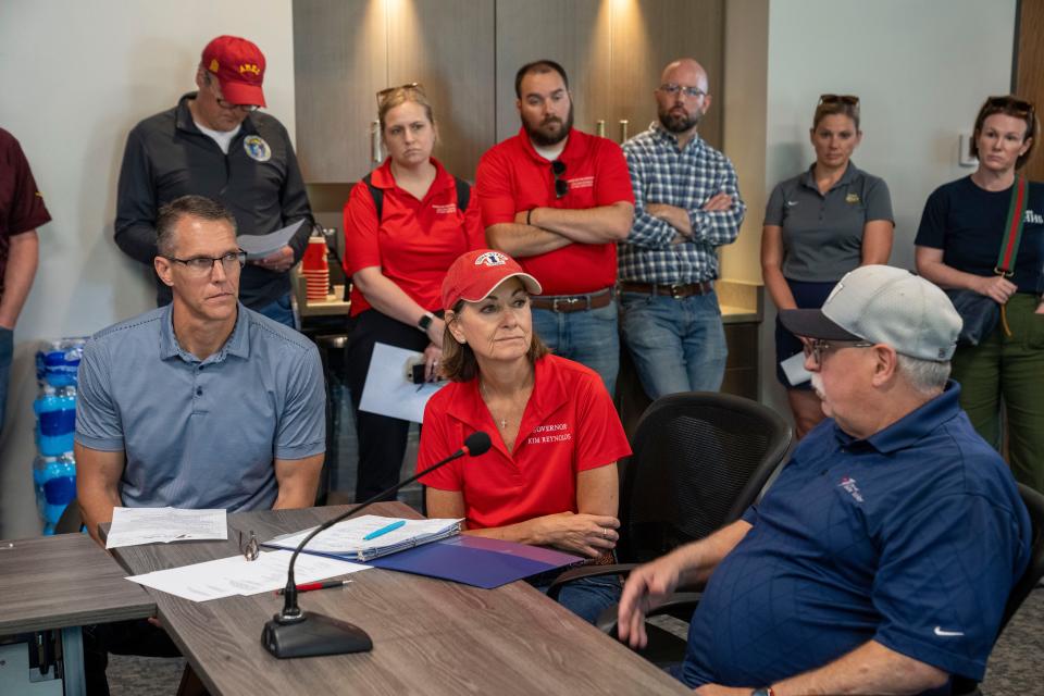 Governor Kim Reynolds speaks with Mayor Kevin Van Otterloo in Rock Valley, Monday, June 24, 2024.